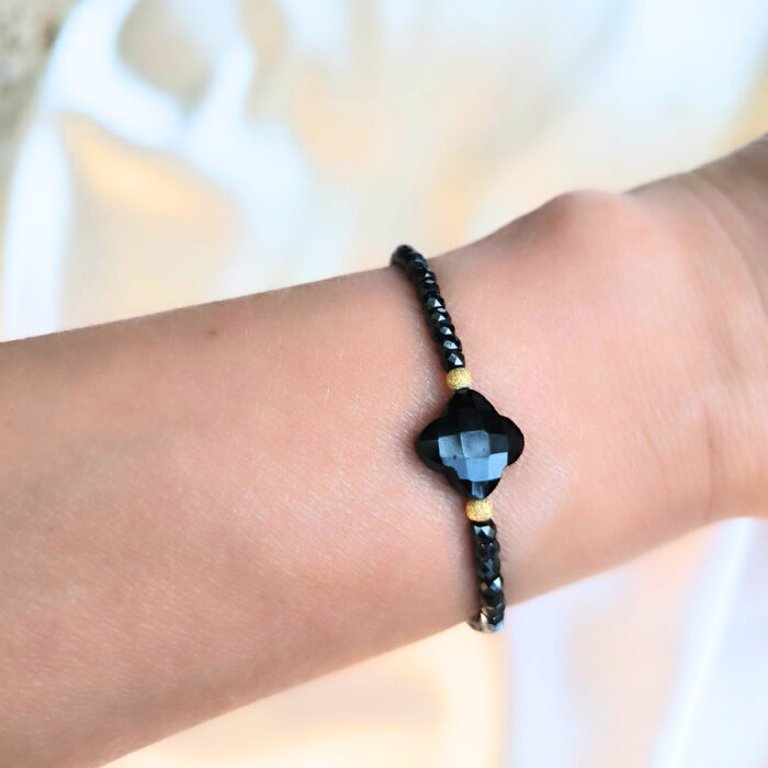 BDE128 BRANSOLETKA Z CYRKONII, Z KONICZYNKĄ Z ONYKSU I SREBRA Z 18K ZŁOTEM